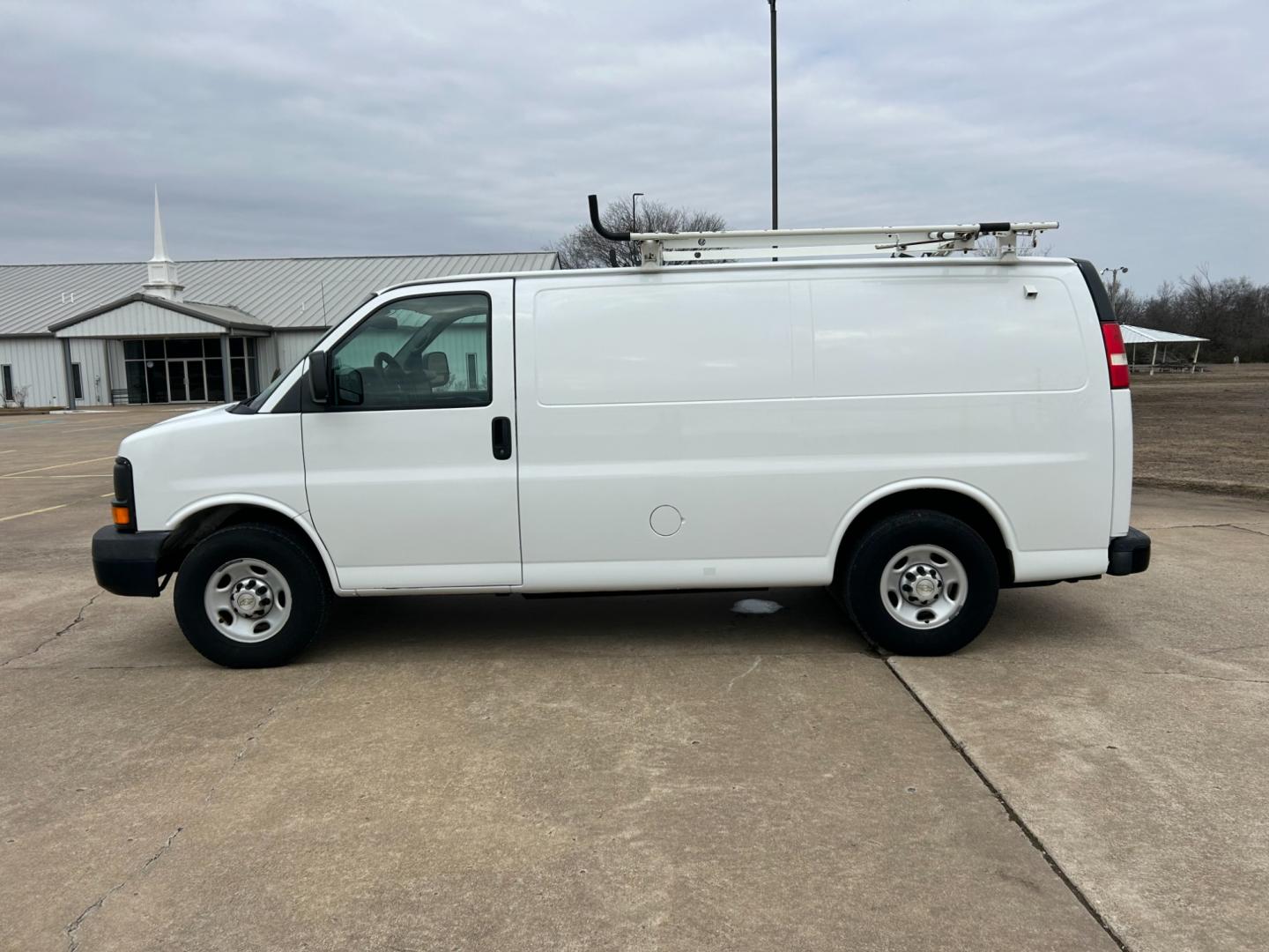 2012 White /Gray Chevrolet Express 2500 Cargo (1GCWGFCB4C1) with an 6.0L V8 OHV 16V FFV engine, 6-Speed Automatic transmission, located at 17760 Hwy 62, Morris, OK, 74445, (918) 733-4887, 35.609104, -95.877060 - Photo#7
